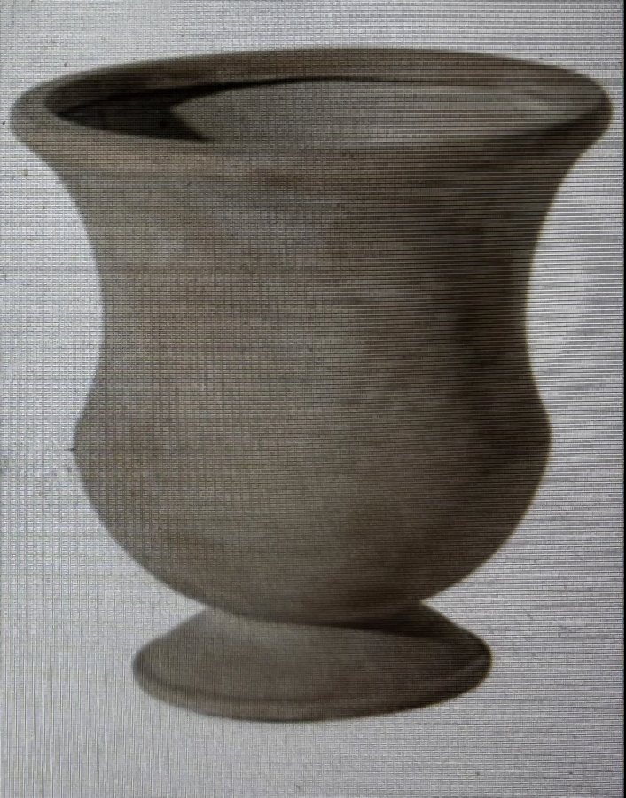 The footed stone urn planter each guest builds in and takes home